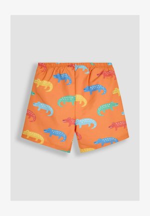 Oranžové plavky s hravým vzorom krokodílov v modrej, žltej, zelenej a červenej farbe. Elastický pás pre pohodlie.