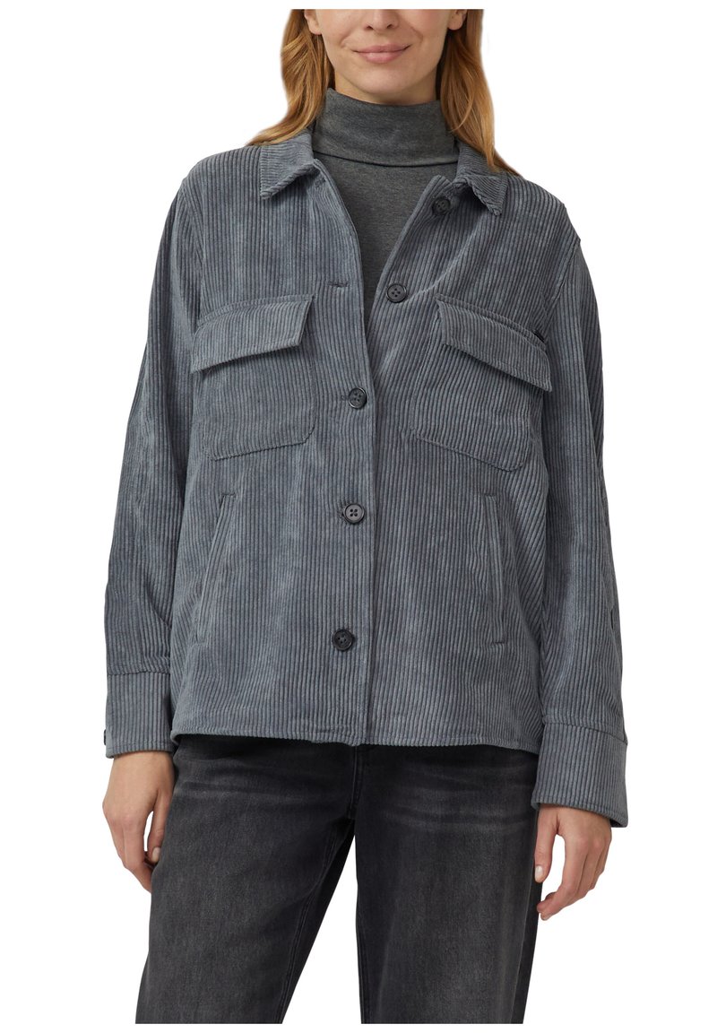 Gray corduroy jacket with a button front, two chest pockets, and long sleeves. Features vertical ribbed texture and a relaxed fit.
