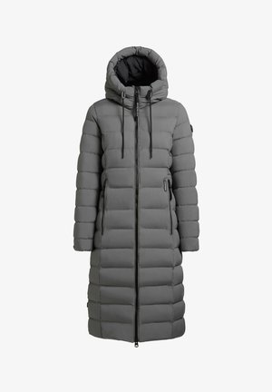 Pelēka, mīksta garā jaka ar kapuci, ar vertikālu šuvju rakstu, priekšējo rāvējslēdzēju un auklītēm. Tai ir sānu rāvējslēdzēja kabatas un gluda tekstūra.