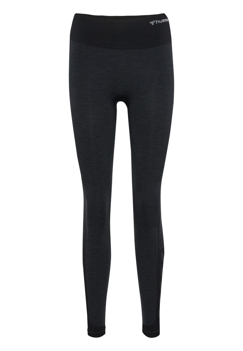 Leggings sportivi neri con un tessuto testurizzato e una ampia cintura elastica. Presentano pannelli laterali per una maggiore traspirabilità.