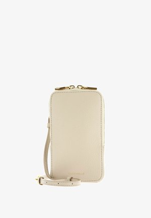 Petit porte-monnaie rectangulaire en cuir beige avec fermeture éclair dorée et sangle réglable, nom de la marque "Coccinelle" embossé au centre en bas.