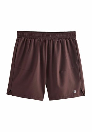 Burgunderfärgade träningsshorts med elastisk midja, sidofickor och små sidsprund för bättre rörlighet. Slät, lättviktsmaterial.
