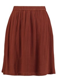 Skirt i rostfärgad nyans gjord av texturerat tyg, med resårmidja och en flödande siluett som slutar ovanför knäet.