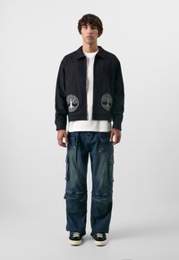 Don't Waste Culture REZO UNISEX - Laza szabású farmerek - dark blue