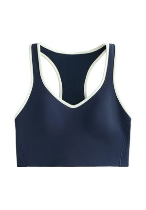 Marineblå sports-bh med V-hals og racerback-design, med hvide detaljer. Fremstillet af elastisk materiale, den har en glat tekstur og ingen polstring.