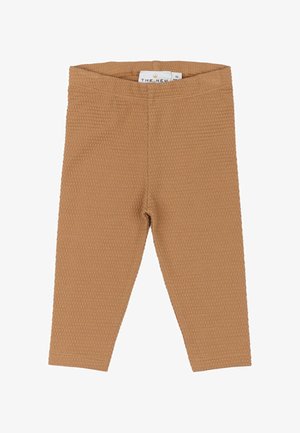 Bralne legice z rjavim teksturiranim površjem in elastičnim pasom. Brez vidnih šivov ali okrasnih detajlov.