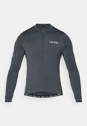 Maillot de ciclismo de manga larga en tejido gris oscuro, con cremallera frontal y logo blanco "LE COL" en el pecho y la manga. Diseño ceñido y elástico.