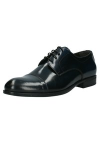 Scarpa da uomo in pelle blu navale con finitura lucida, punta affilata, design con lacci e sottili dettagli di cucitura lungo la parte superiore.