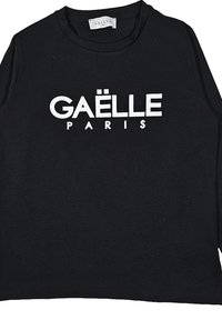 Maglietta nera a maniche lunghe in cotone. Presenta una grande stampa bianca con "GAËLLE PARIS" ben visibile sul davanti.