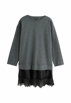 Gray sweatshirt with long sleeves and a rounded neckline, layered over a black satin skirt featuring a lace hem. Soft texture and casual design.