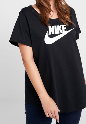 Sort kortærmet t-shirt lavet af bomuld, med en stor hvid Nike-logo på forsiden. Løs pasform med rund halsudskæring og lige kant.