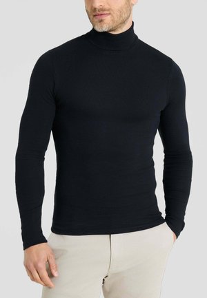 Maglia a collo alto nera realizzata in un tessuto liscio e elasticizzato. Maniche lunghe e design aderente, con colletto alto e senza motivi visibili.