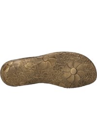 Suela de zapato de goma con un patrón floral texturizado; color marrón claro con diseños elevados de varias flores y un borde liso.