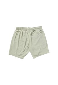 Shorts légers de couleur vert clair, avec une taille élastique et une poche arrière. Texture lisse, longueur au genou, design simple, sans motifs.