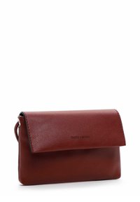 Red leather clutch bag with a textured finish, rectangular shape, and a flap closure. Subtle branding on the front.