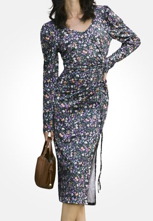 Sukienka w kwiaty z długim rękawem w kolorze czarnym, z żywymi różowymi, fioletowymi i pomarańczowymi kwiatami, z bocznym rozcięciem i marszczonym detalem w talii.