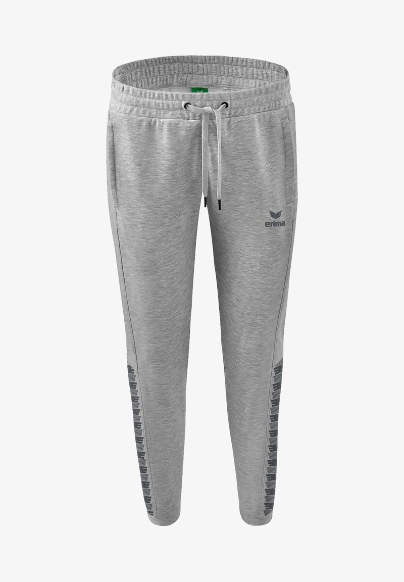 Graue Sporthosen aus weichem Material mit einem Kordelzugbund, versehen mit Seitestreifen mit einem Logo und einem schmal zulaufenden Design.