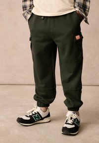 Superdry REGULAR FIT  - Tracksuit bottoms - khaki green