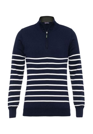 Maglione a collo alto blu navy con zip a un quarto, maniche lunghe e strisce orizzontali bianche sul corpo. Realizzato in un morbido materiale lavorato a maglia.