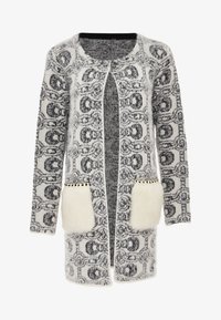 Selected, wollweiss schwarz