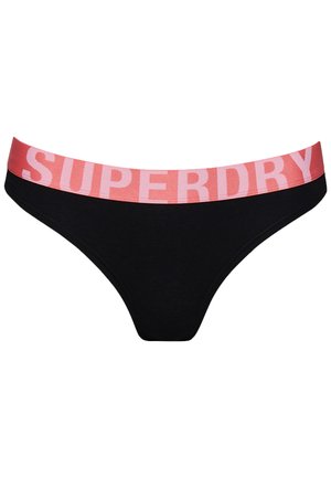 String noir avec une large ceinture en élastique rose portant l'inscription « SUPERDRY » en lettres épaisses. Tissu lisse avec un design minimal.