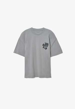 Grau Baumwoll-T-Shirt mit kurzen Ärmeln, Rundhalsausschnitt und einem schwarzen Grafiklogo auf der linken Brust. Weiche Textur und lässige Passform.