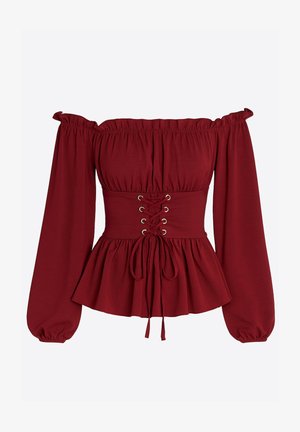 Blusa burdeos sin hombros con mangas largas abullonadas, frente con cordones y ojales metálicos, y bajo con volante. Textura de tela suave.