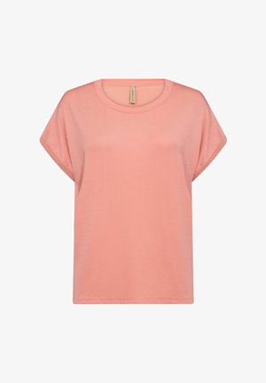Cotton pink t-shirt with a round neckline, short sleeves, and a loose fit. Features a subtle ribbed texture. Straight hem.