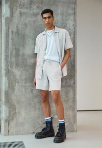 Puma CLASSICS - Jogginghose - platinum gray