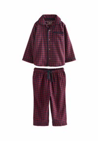 Rutet pyjamasæt i marineblå og rød. Langærmet top med knaplukning og lomme; bukser med elastisk talje og snor. Blødt stof.
