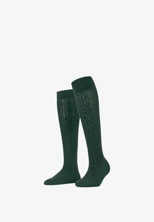 Par de calcetines hasta la rodilla de punto en verde oscuro con un patrón trenzado, mostrados en posición vertical sobre un fondo blanco.