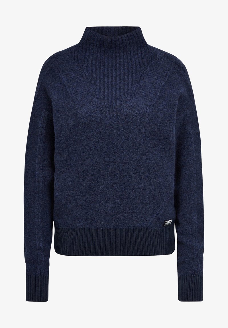 Pull en maille bleu marine avec un col montant côtelé, des poignets et un ourlet, présentant un motif texturé subtil sur le devant et une petite étiquette logo près de l'ourlet.