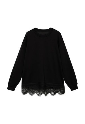 Suéter negro de manga larga, cuello redondo y un borde de encaje scalloped en el dobladillo. Fabricado con tela suave de textura mate.