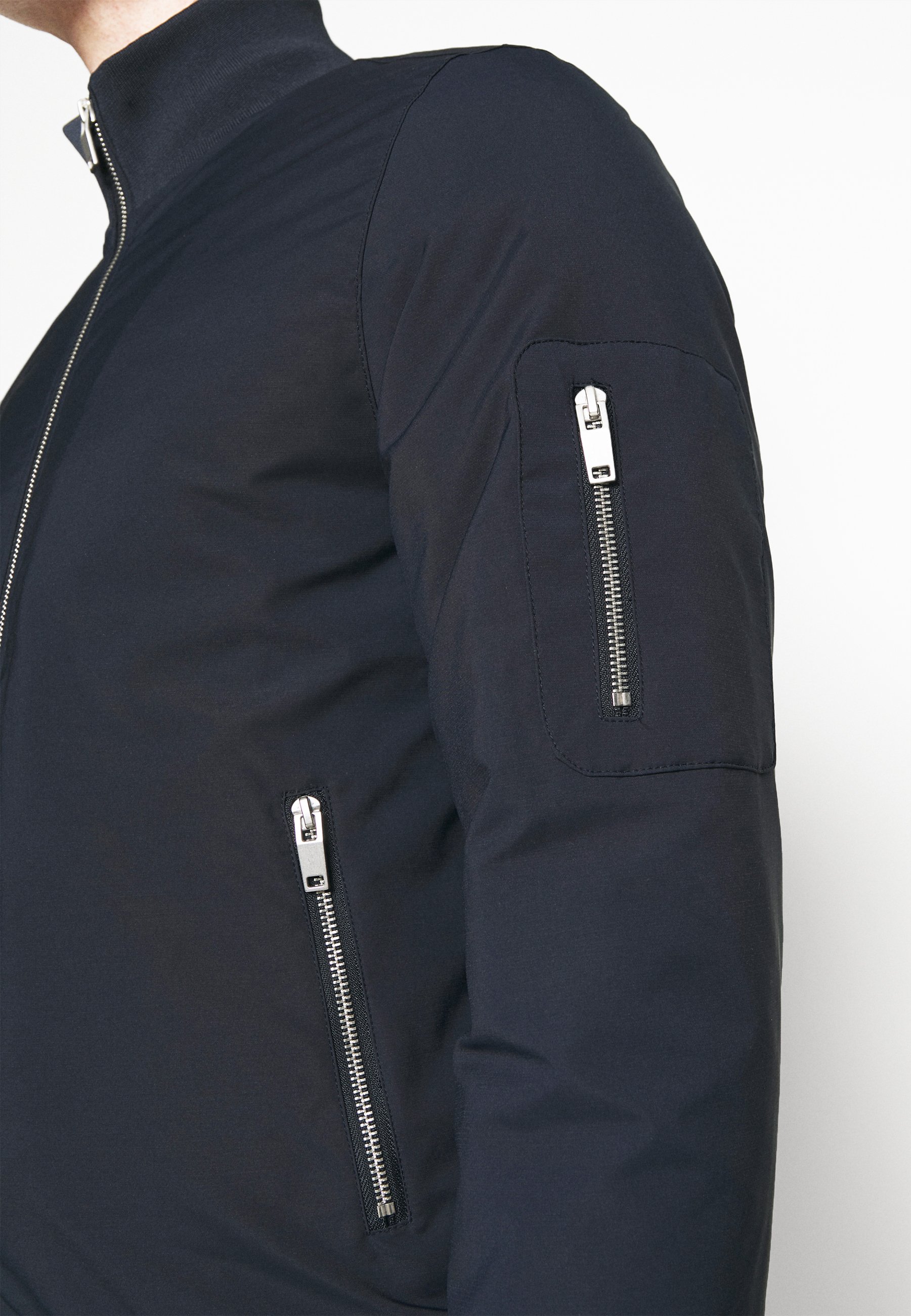 navy padded bomber jacket