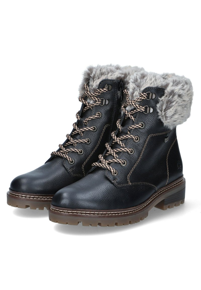 Zwarte leren laarzen met faux fur rand, ronde neus, vetersluiting, gestructureerd oppervlak en duurzame rubberen zool met grippatronen.