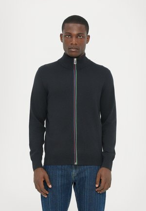 Black zip-up sweater with a high collar, ribbed cuffs, and a striped accent down the front. Fabric appears fine and smooth.