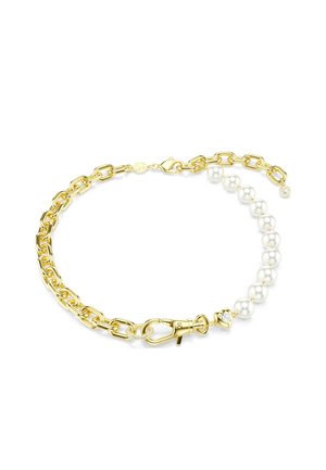 Bracelet chaîne en or avec perles alternées, fermoir en forme de cœur et petits détails en cristal clair sur fond blanc.