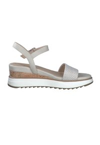 Sandaal met straps, voorzien van een zachte beige bovenkant, geweven structuur op de voorband, kurken tussenzool en een witte rubberen buitenzool met een geribbeld ontwerp.