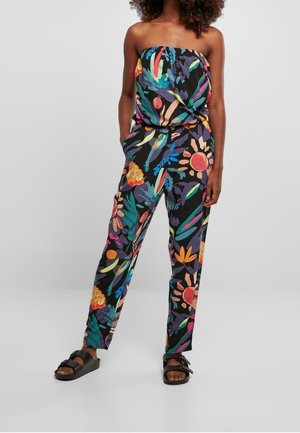 Kombinezon bez rękawów i bez ramiączek z wielokolorowym kwiatowym wzorem na czarnym tle, z elastyczną talią i bocznymi kieszeniami.