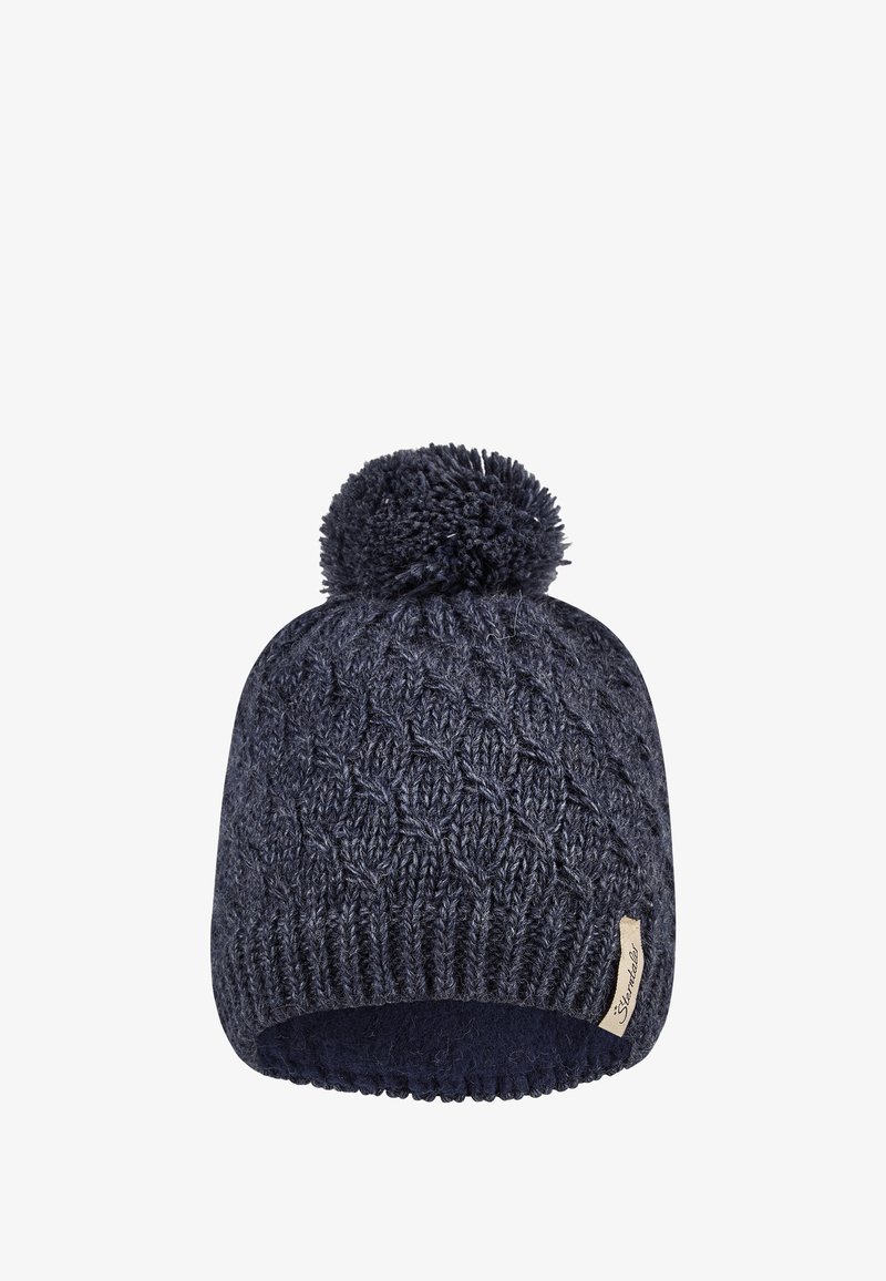 Dark blue knitted winter beanie with a pom-pom on top and a small beige tag on the side against a white background.