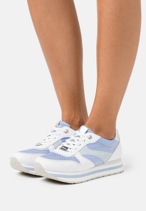 White and light blue athletic sneakers with mesh and synthetic leather materials, round toe, lace-up front, and striped sole.