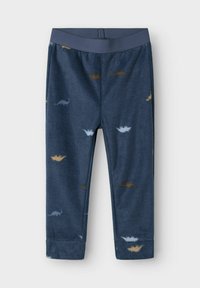 Leggings en polaire marine avec une texture douce, ornées de petits motifs de dinosaures en beige et bleu clair. Ceinture élastique pour le confort.