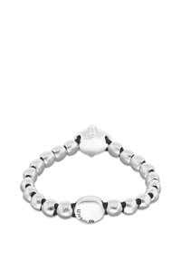 Pulsera de cuentas plateadas con cuentas metálicas lisas dispuestas en una banda elástica negra, con un charm central pulido de plata.