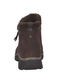 Bruine suède enkellaarsjes met een kraag van imitatiebont, afgeronde vorm, subtiele metalen accenten en een geribbelde rubberen zool voor grip.