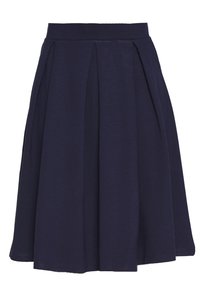 Laivastonsininen luisteluhame, joka on valmistettu pehmeästä kankaasta ja jossa on korkea vyötärö sekä laskokset, jotka luovat levenevän muodon. Suora helma alaosassa.