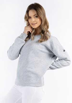 Grijze sweatshirt in een relaxed fit, met lange mouwen, een ronde halslijn en textuurstof. Inclusief een klein logo detail op de mouw.