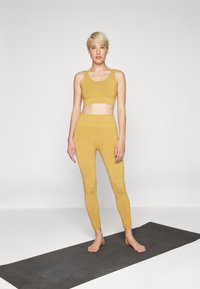 Yogasearcher ASA SEAMLESS LEGGING - Tajice - curry