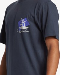 Navy blue cotton t-shirt featuring a geometric graphic in blue and silver on the chest with a logo. Short sleeves and relaxed fit.