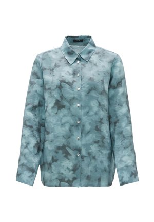 Chemise bleu clair à manches longues, avec un motif floral subtil et un col classique, fabriquée dans un tissu léger et doux.