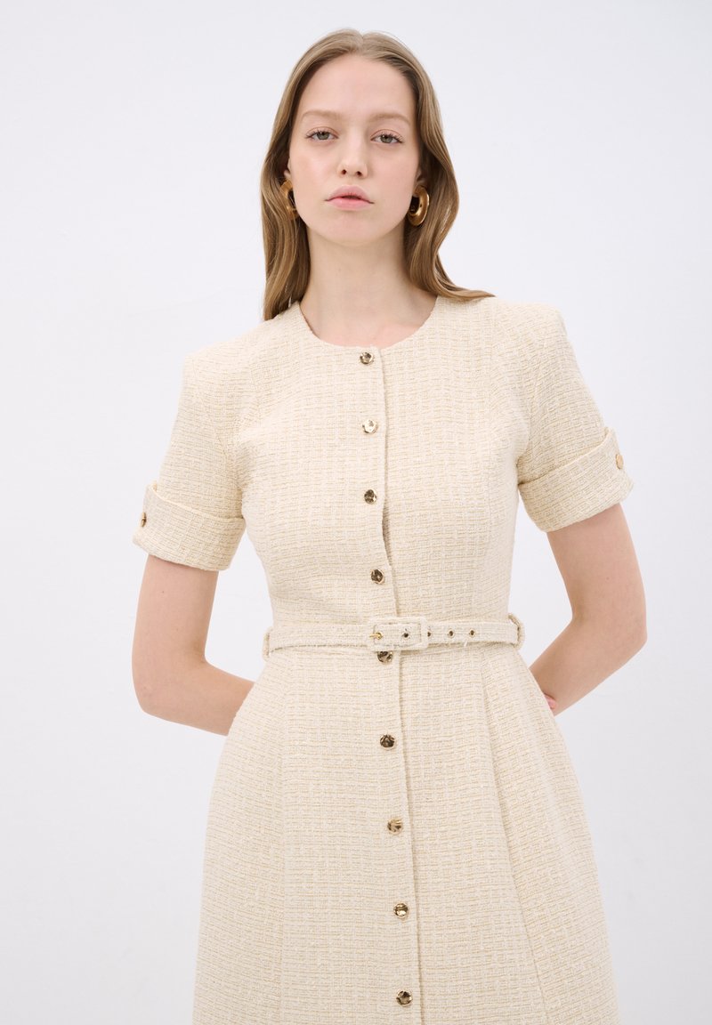 slim fit dress slacks Knitted Midi Dress with Gold Buttons and Peplum Waist main image 1